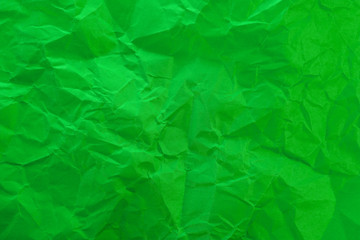 
Crumpled green paper as background