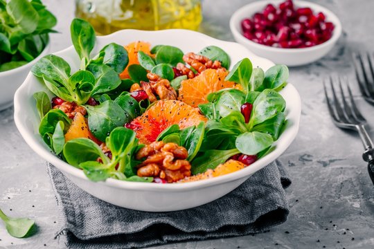 Green Lamb’s lettuce corn salad with blood oranges, walnuts, pomegranate and chia seeds