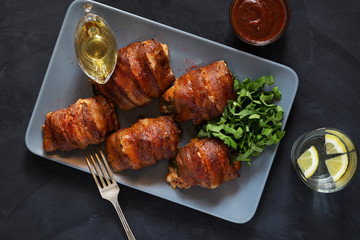 Stuffed chicken breasts rolled in bacon overhead