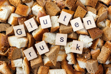 Slice of rusk bread with Gluten rusktext concept - Powered by Adobe