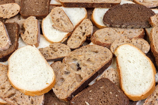 Sliced white and brown loaf of bread