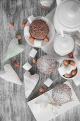 Teapot, cupcakes and different decorations