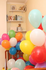 Fototapeta na wymiar children's room balloons lot ribbons celebration