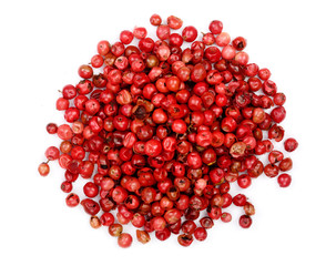 pink peppercorns seeds isolated on white background. Top view. Flat lay