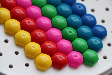 children's mosaic..background of multi-colored children's mosaic. colored stripes of plastic details of children's mosaic