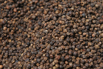 Beautiful and fresh seasoning black pepper, close-up from the seller in the market