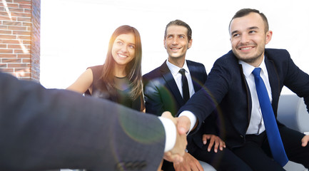 closeup of a business handshake partners