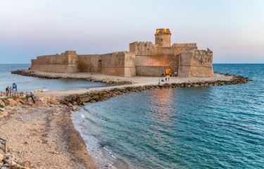 Aerial view of Aragonese Fortress at sunset, Calabria, Italy