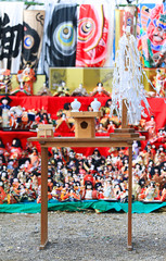 Japanese dolls & ritual articles set displaying on tiered stand during the Grand Bonfire Ceremony of farewell memorial service of old, used dolls at the Japan Shinto shrine Close up, Magnified image 2