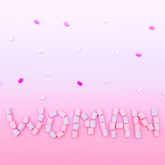 the inscription the Woman laid out the marshmallows with sweets on gradient background