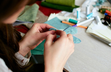 Fototapeta premium Step-by-step process of manual manufacturing baby crib mobile.