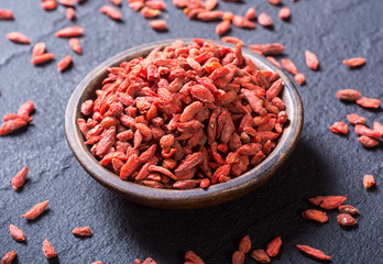 Goji berries in wooden spoon