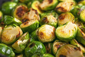 Vegetarian cuisine. Brussels Sprouts roasted with olive oil. Copyspace