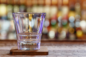 Clean empty cocktail glass on the bar