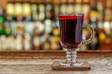 Mulled wine in a glass with a handle