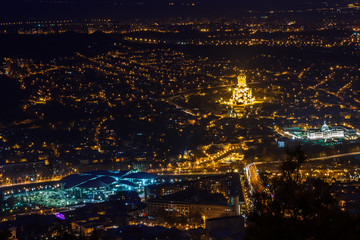 Night view to the Tbilisi city center with Holy Trinity Cathedral and presedential palace, Georgia