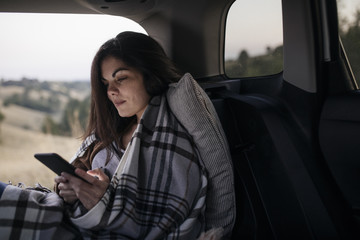 Woman Traveler Using Cell Phone
