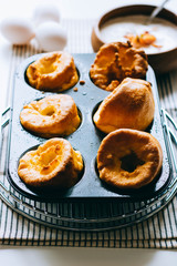 Yorkshire puddings with fish filling, in an old metal tray