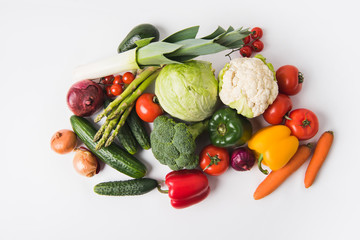 various vegetables laying on white background