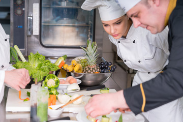 Chef Cooking, Cutting and preparing next plate
