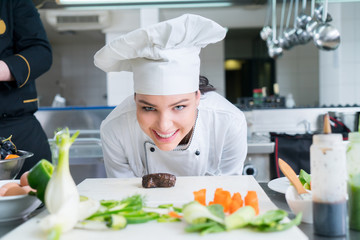 Chef Cooking, Cutting and preparing next plate