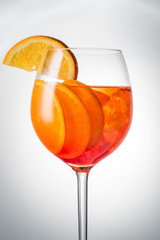 Summer refreshing faintly alcoholic cocktail Aperol spritz in a 