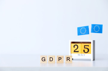 General Data Protection Regulation (GDPR) text and EU flag calendar may 25