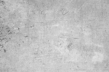 Old concrete wall with scuffs of gray color, texture background