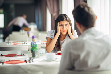 Disaster news.Reaction for negative event.Shocked woman in disbelief.Desperate angry female hearing disappointing information.Loosing job,getting a divorce,breaking up.Worried woman with problems