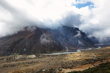 Cholatse (6335m) and Tabuche Peak (6367m) between clouds,