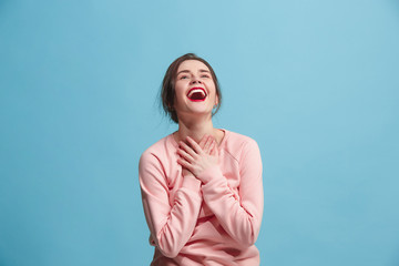 Winning success woman happy ecstatic celebrating being a winner. Dynamic energetic image of female...