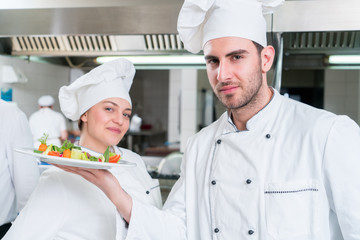 Chef Cooking, Cutting and preparing next plate