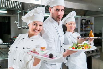 Chef Cooking, Cutting and preparing next plate