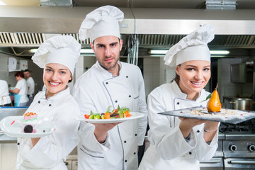 Chef Cooking, Cutting and preparing next plate