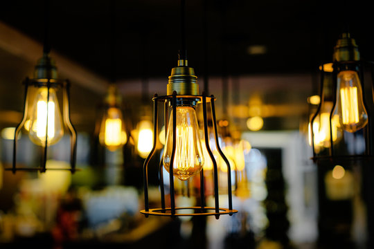 Light, design and interior. Vintage metallic lanterns.