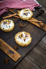 sweet cakes with white cream