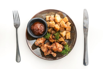 roasted sleeves chicken with potatoes and barbecue sauce