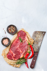 Raw beef steak with spices ready for cooking dinner