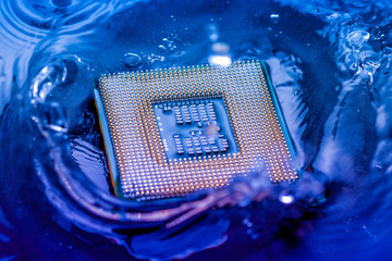 technology cyber electronic concept. cpu ram computer Fall into the water on blue light background....