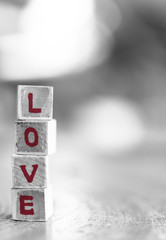 Love message written in wooden blocks.