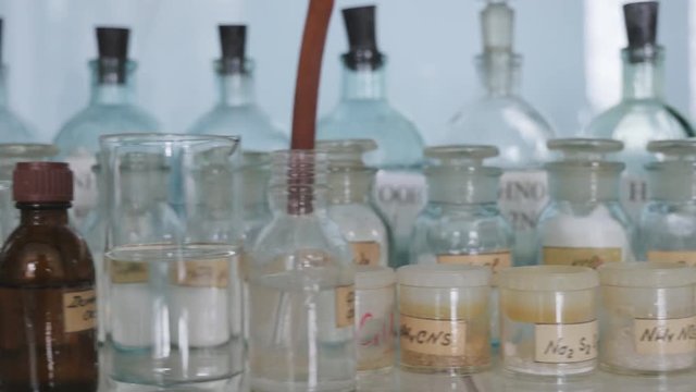 Chemical laboratory. Bottles with reagents are in a laboratory
