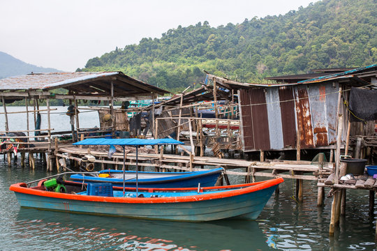 Houses on stilts and pier in the fishing village on Ko Chang island, Thailand.