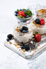 healthy creamy dessert with fresh berries, vertical top view