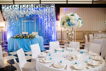 Empty festive tables in a restaurant. Wedding banquet Hall