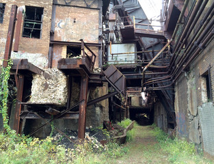 Fototapeta na wymiar View Down a Dark Hallway at the Abandoned Historic Carrie Blast Furnace, Part of Carnegie's Pittsburgh Steel Mills