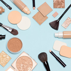 Foundation makeup products flat lay with copy space