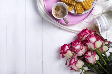 Coffee with waffles and roses. Valentine's Day or 8 march . Delicious Breakfast.