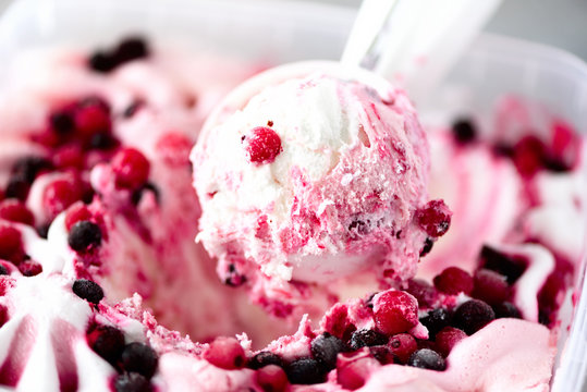 Strawberry ice cream texture. Summer food concept, copy space, top view. Sweet yogurt dessert or berries ice-cream background.