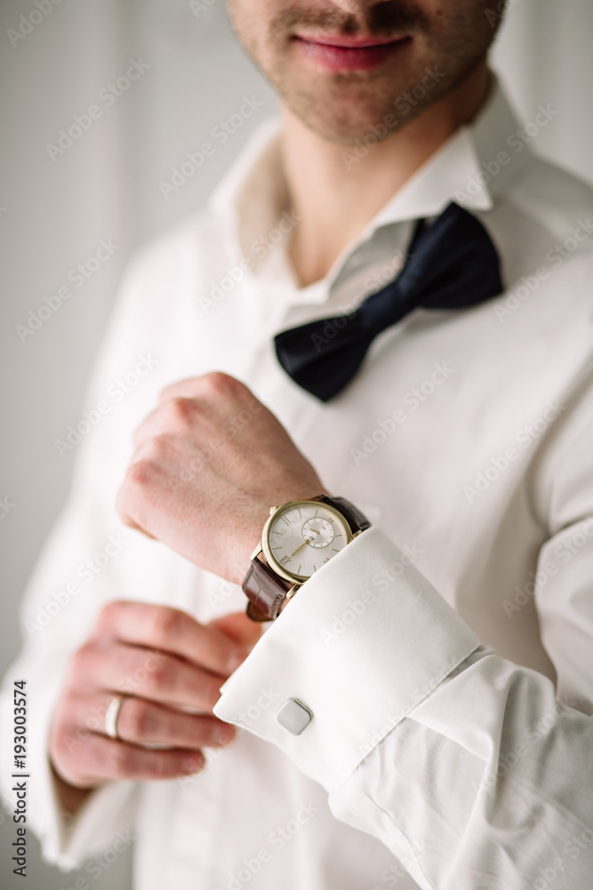 Wall mural a man's hand with a watch. wrist watch, classic