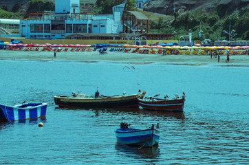 Fototapeta na wymiar Boats, Beach and Lima